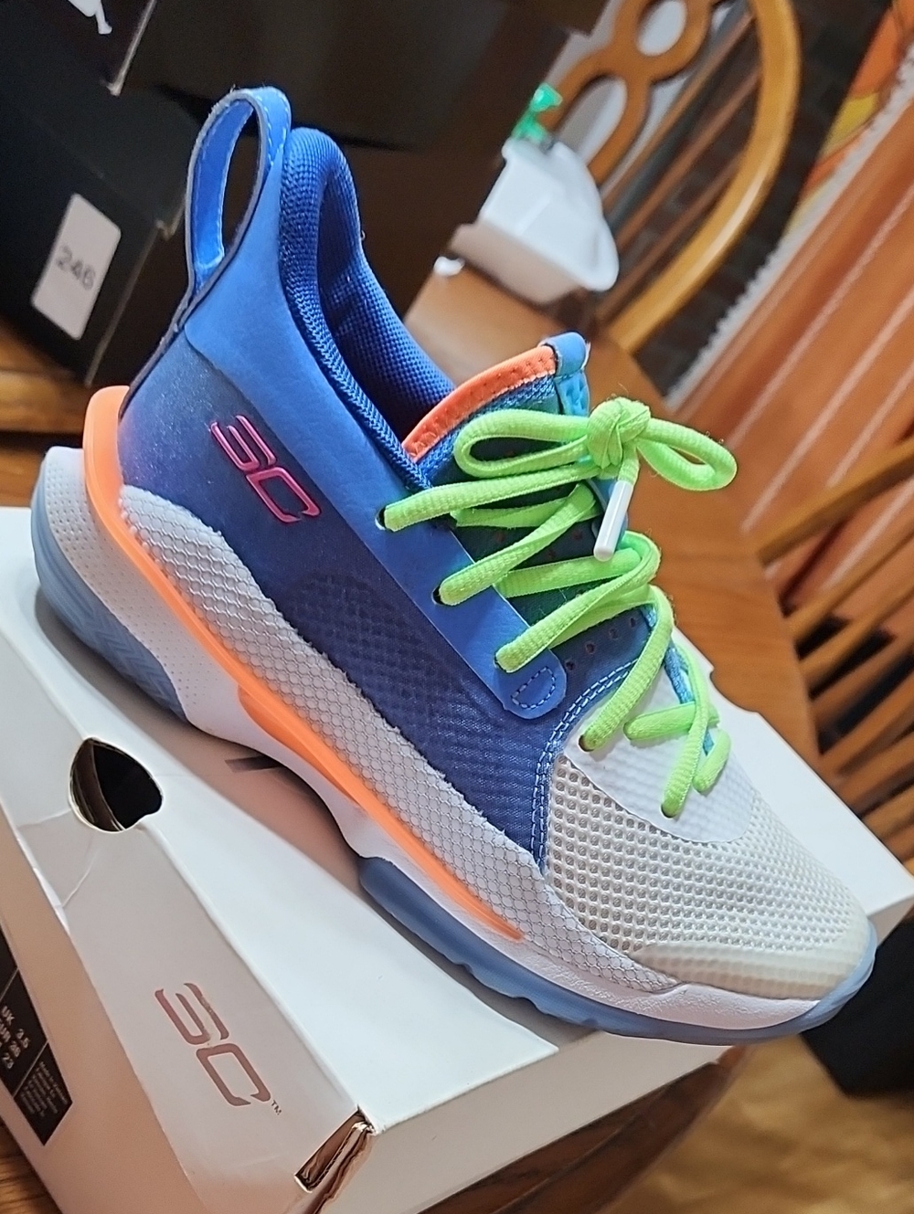 Under Armour Kids Blue Sneakers with Neon Green Laces and Orange Accents